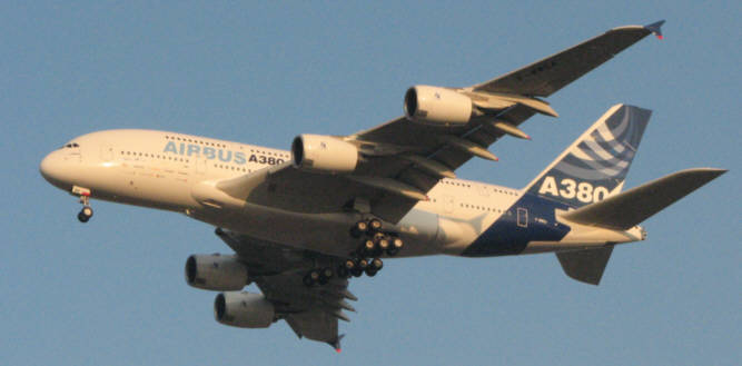Airbus A380 flys over Wichita, to salute the Wichita engineers who designed its massive wing. R. Harris photo.
